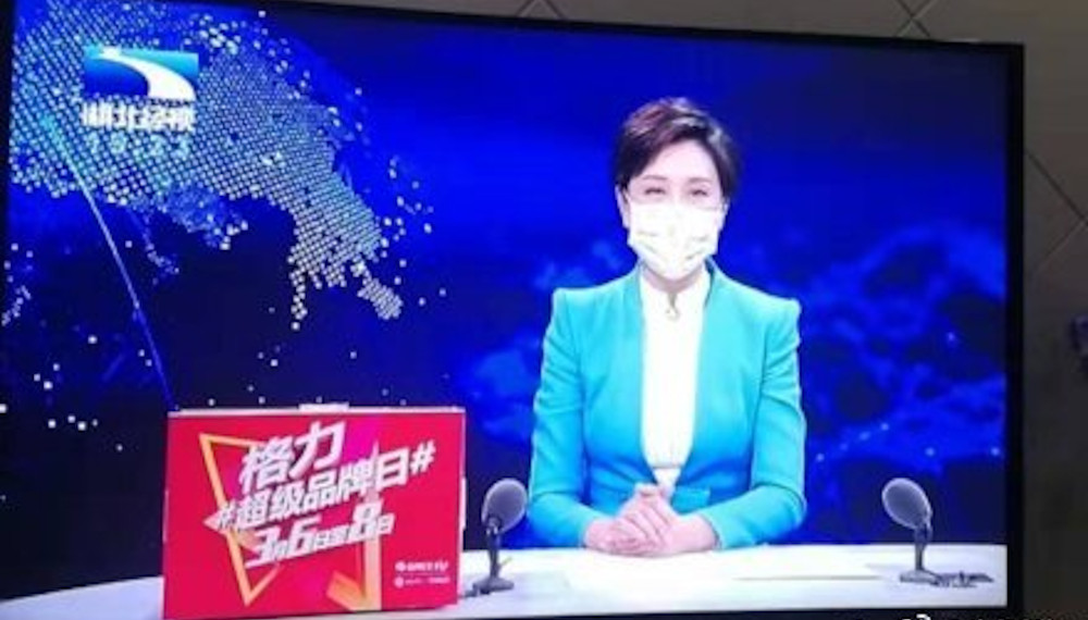 În Wuhan, și prezentatoarele TV poartă măști de protecție, de teama coronavirusului
