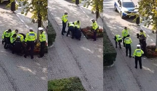 VIDEO / Șapte polițiști s-au luptat să pună cătușele unui șofer, în Vâlcea: „Ajutooor!”