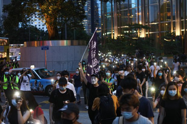 Opt activişti pro-democraţie din Hong Kong, arestați pentru participarea la protestele de acum șase luni
