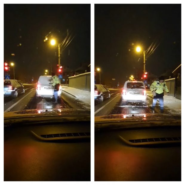 VIDEO | Un poliţist s-a dat jos din autospecială pentru a-i curăța  luneta de zăpadă şoferului din faţa lui