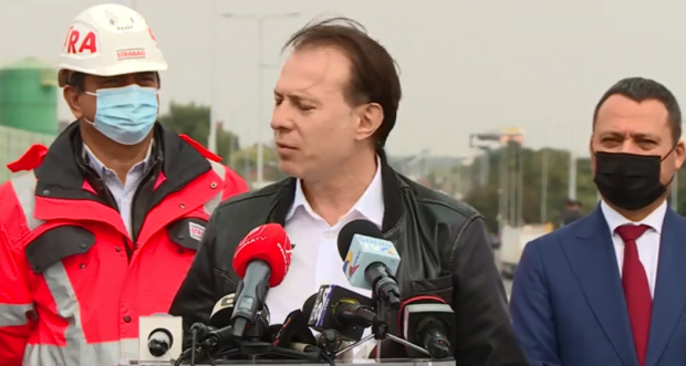 VIDEO. Camionagiii l-au bruiat pe Cîțu cu un cor de claxoane, la inaugurarea Pasajului Mogoșoaia: „Sunt supărați și e normal”