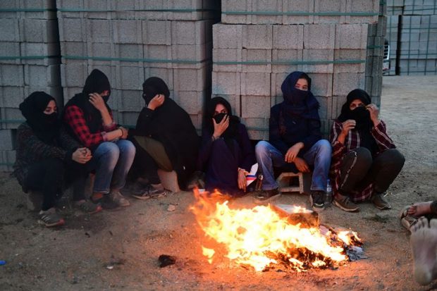 Migranți desculți și fără haine găsiți morți de frig la granița Turciei cu Grecia
