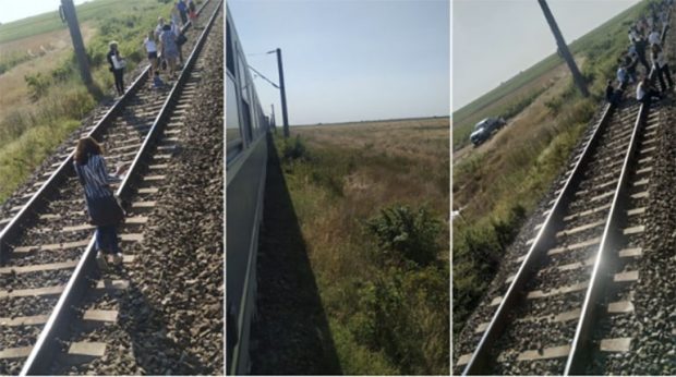 Tren de la Târgu Jiu, blocat în câmp de trei ore. Oamenii au așteptat în căldură