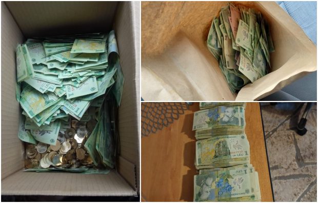 Un șofer român de TIR și-a primit salariul în cutii de carton, în monede de 50 de bani și bancnote de un leu