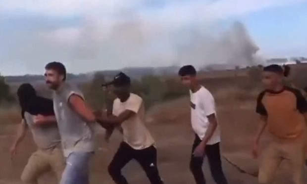 „A fost un masacru”. După ce s-au adăpostit de rachete, participanții la un festival din Israel au fost atacați de luptători Hamas înarmați