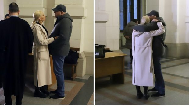Laura Vicol și soțul ei, Vladimir Ciorbă, îmbrățișați chiar înainte să fie urcați în dubă și duși în arest, după ce au fost arestați preventiv