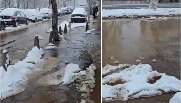Stradă din București, inundată după ce tot orașul a fost acoperit de un strat gros de zăpadă