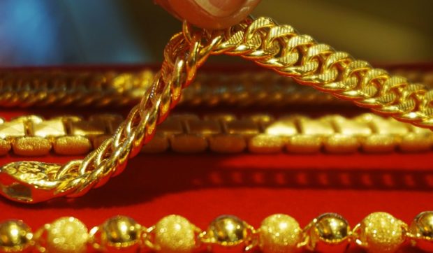 Prețul aurului, la un nou record din cauza temerilor unui război comercial SUA-China
