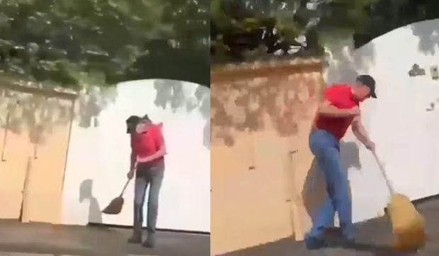 Klaus Iohannis a fost filmat când mătură trotuarul în fața casei sale din Sibiu