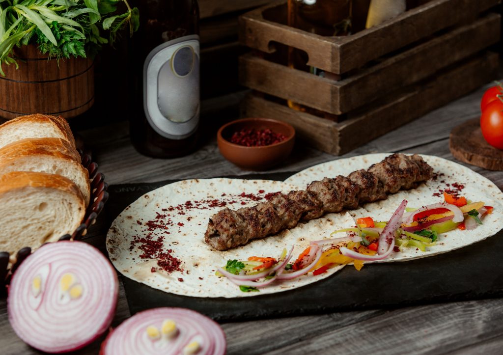 lule kebab with onion salad lavash