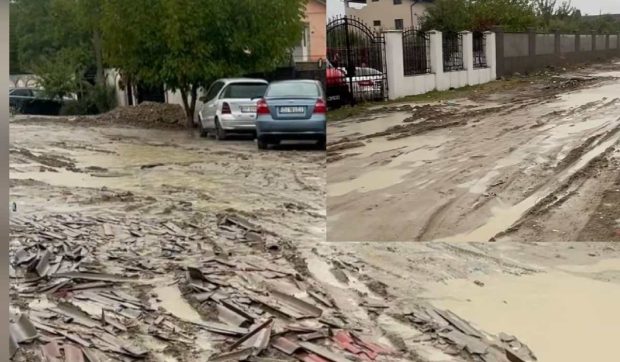 Străzile de la periferia orașului Craiova sunt pline de noroi după fiecare ploaie: „Umblăm cu cizme de cauciuc”