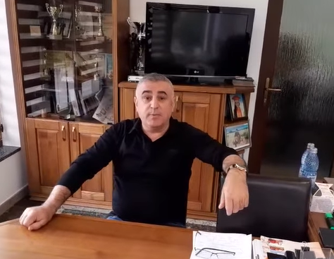 Traian Larionesi - afacerist din Bistrița Năsăud, imbrăcat la in negru